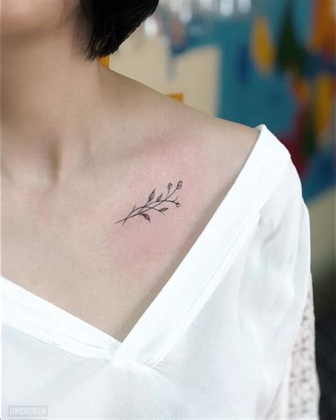 Small upper chest tattoos for women